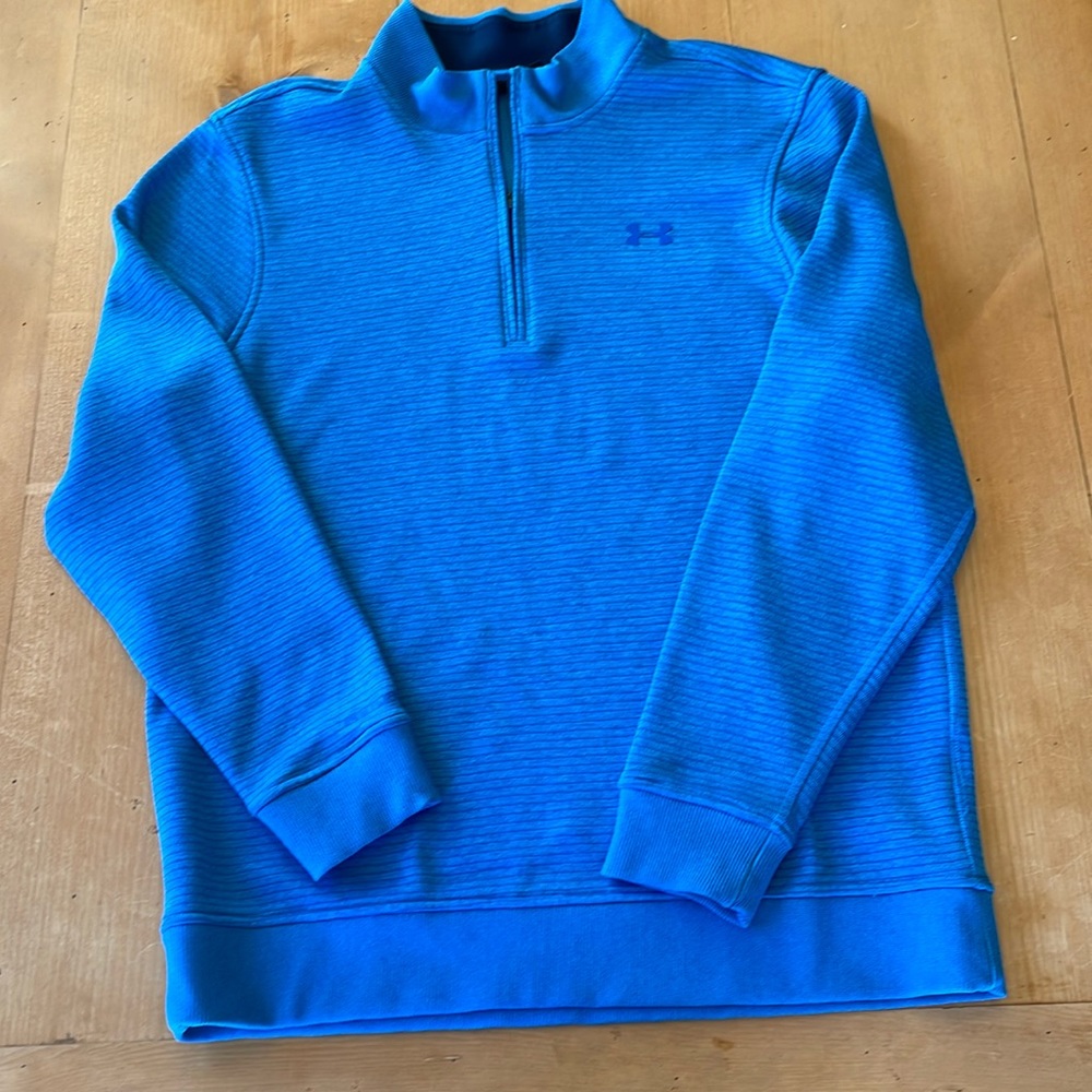 Under Armour size L blue striped half-zip pullover.  Ribbed collar, cuffs & hem.